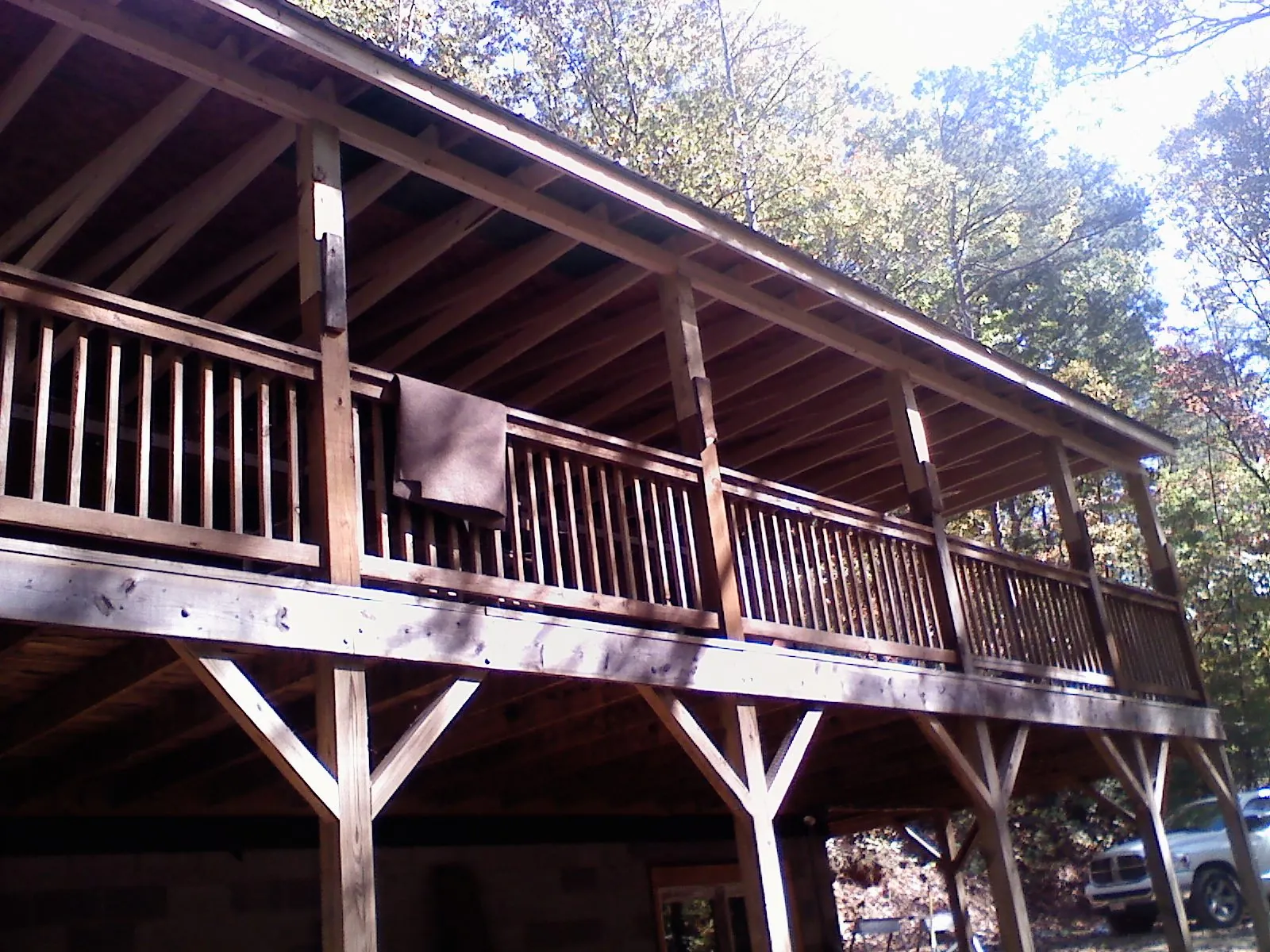 Timber framing under a new elevated porch and deck — Roof Leak Repair in Bassfield by Roofing Brothers